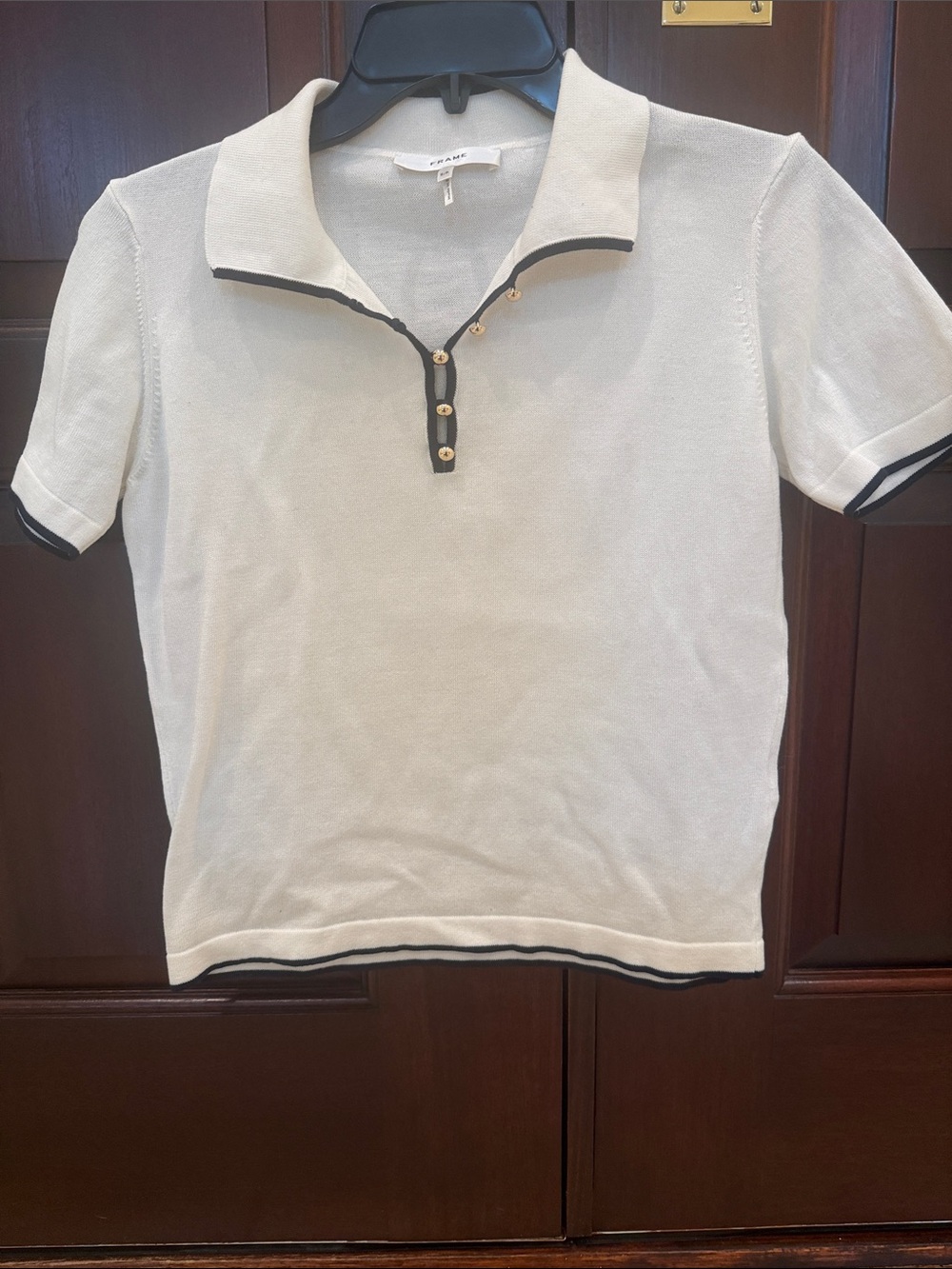 Frame Denim White Short-Sleeve Polo with Black Trim and Gold Buttons